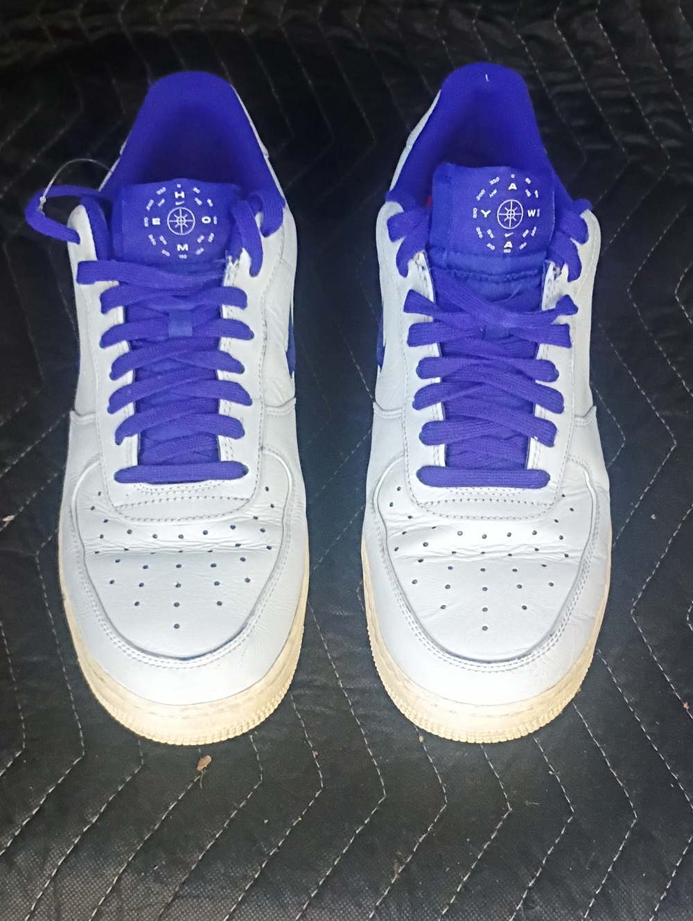 Nike White Low-Top Sneakers with Purple Laces and Collar